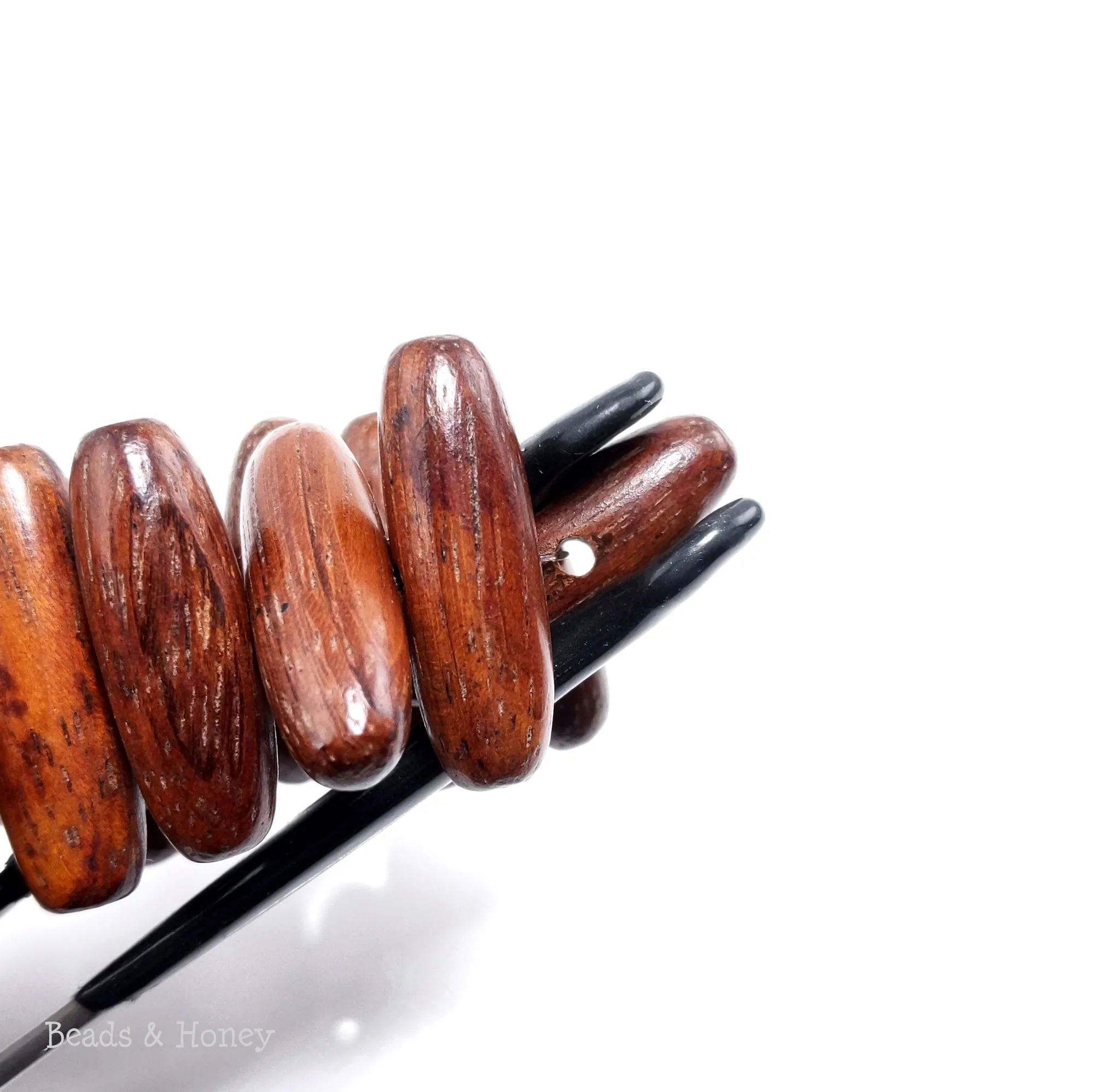 Bayong Wood Capsule/Oval Side Drill 24x8mm (8-Inch Strand)