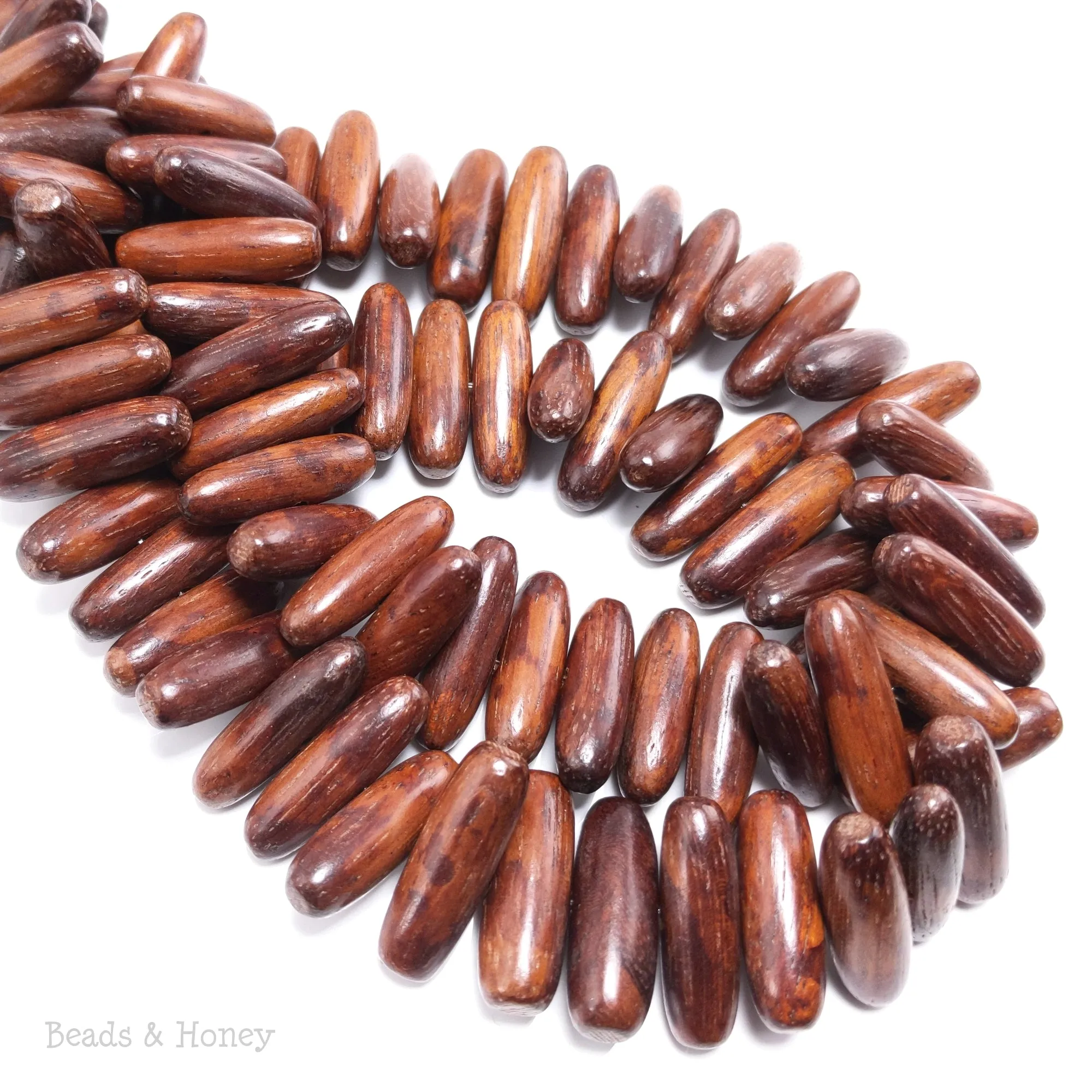 Bayong Wood Capsule/Oval Side Drill 24x8mm (8-Inch Strand)