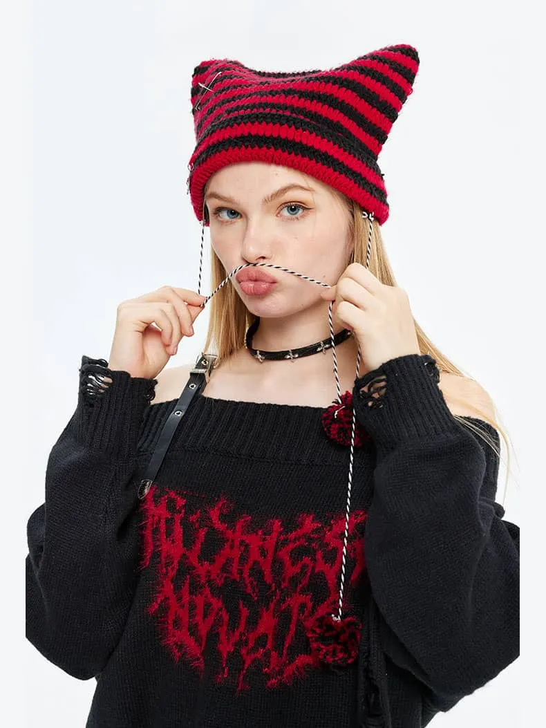 Loose-fitting sweater with one-shoulder design